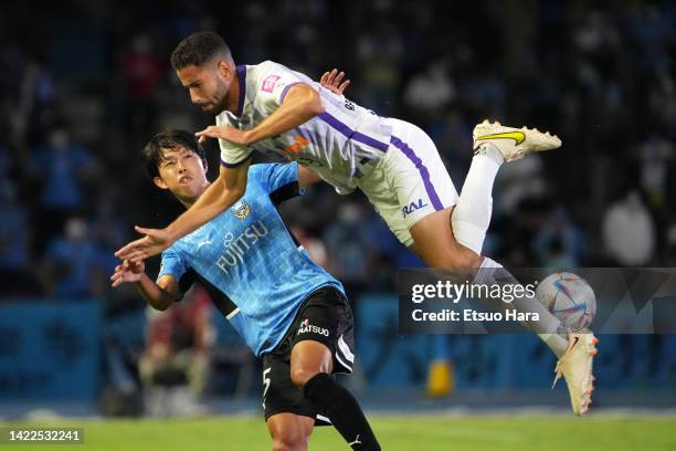 Asahi Sasaki of Kawasaki Frontale and Nassim Ben Khalifa of Sanfrecce Hiroshima compete for the ball during the J.LEAGUE Meiji Yasuda J1 29th Sec....