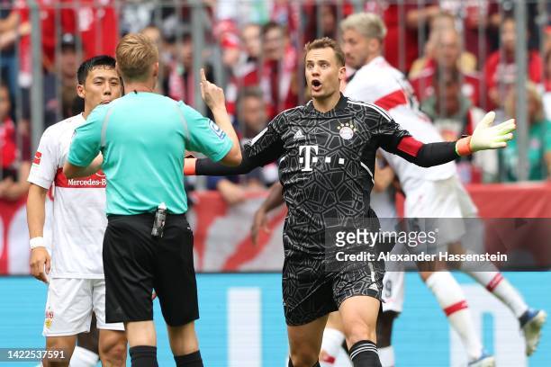 Manuel Neuer of Bayern Munich appeals to referee Christian Dingert after Sehrou Guirassy of VfB Stuttgart scores a goal which is disallowed by VAR...