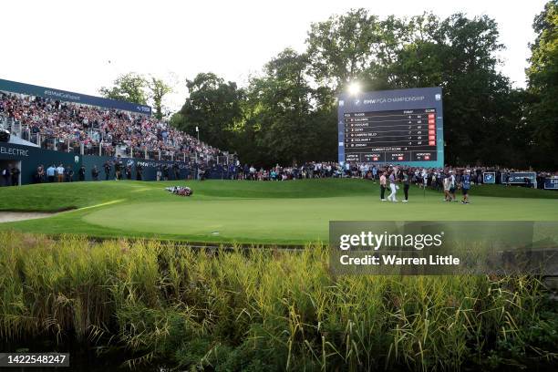 General view as Rory McIlroy of Northern Ireland looks on as Billy Horschel of The United States shakes hands with Matthew Fitzpatrick of England on...