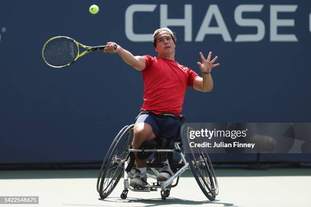 Dahnon Ward of Great Britain returns a shot against Ben Bartram of Great Britain during their Junior Boy's Wheelchair Singles Final match on Day...