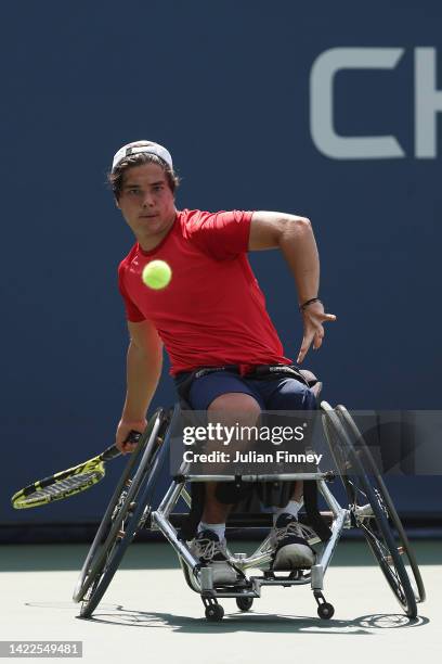 Dahnon Ward of Great Britain returns a shot against Ben Bartram of Great Britain during their Junior Boy's Wheelchair Singles Final match on Day...