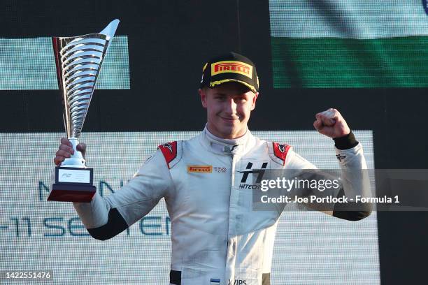 Race winner Juri Vips of Estonia and Hitech Grand Prix celebrates on the podium during the Round 13:Monza Sprint race of the Formula 2 Championship...