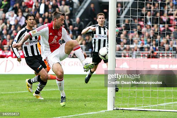 Theo Janssen of Ajax scores the first goal of the game during the Eredivisie match between Ajax Amsterdam and SC Heracles Almelo at Amsterdam Arena...