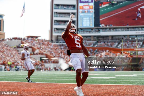 Bijan Robinson of the Texas Longhorns scores a touchdown in the second quarter against the Alabama Crimson Tide at Darrell K Royal-Texas Memorial...