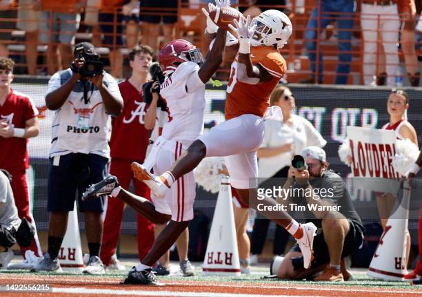 Kool-Aid McKinstry of the Alabama Crimson Tide breaks up a pass intended for Ja'Tavion Sanders of the Texas Longhorns in the end zone in the first...