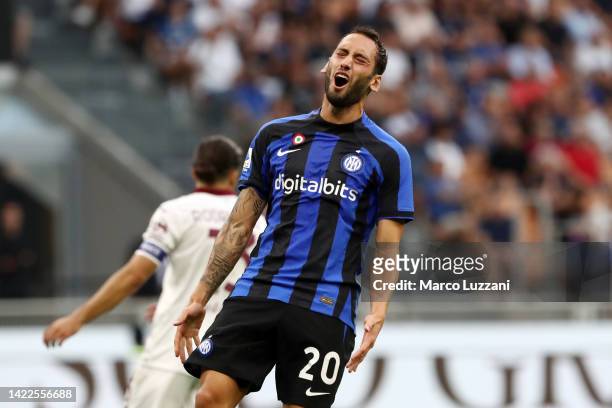 Hakan Calhanoglu of FC Internazionale reacts during the Serie A match between FC Internazionale and Torino FC at Stadio Giuseppe Meazza on September...
