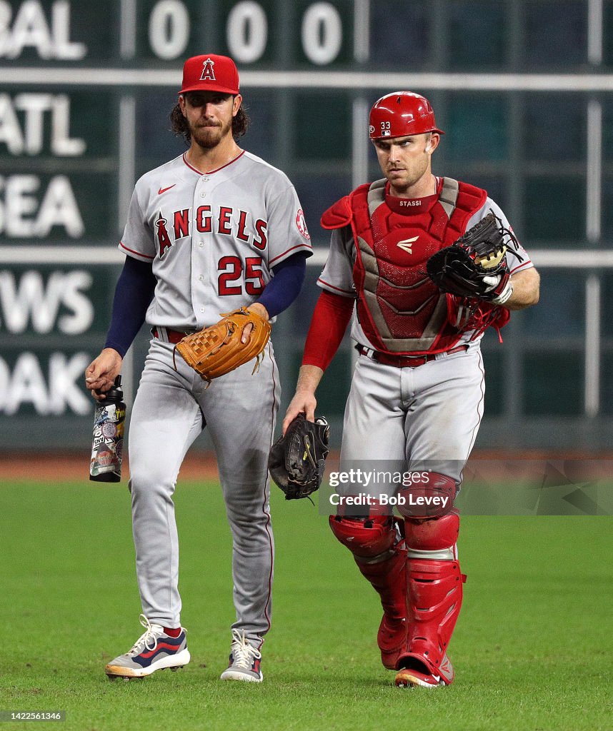 Max Stassi Michael Lorenzen of the Los Angeles Angels and Max Stassi walk in ...
