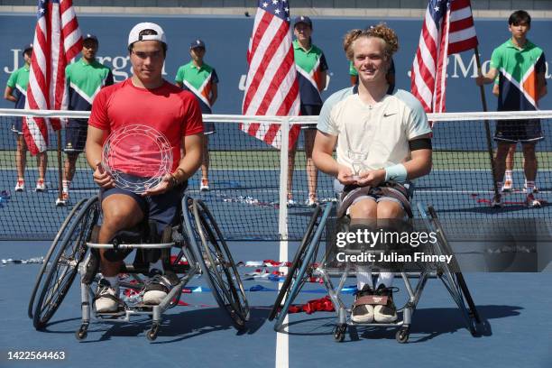 Dahnon Ward of Great Britain holds the runner-up trophy alongside Ben Bartram of Great Britain who celebrates with the championship trophy after...