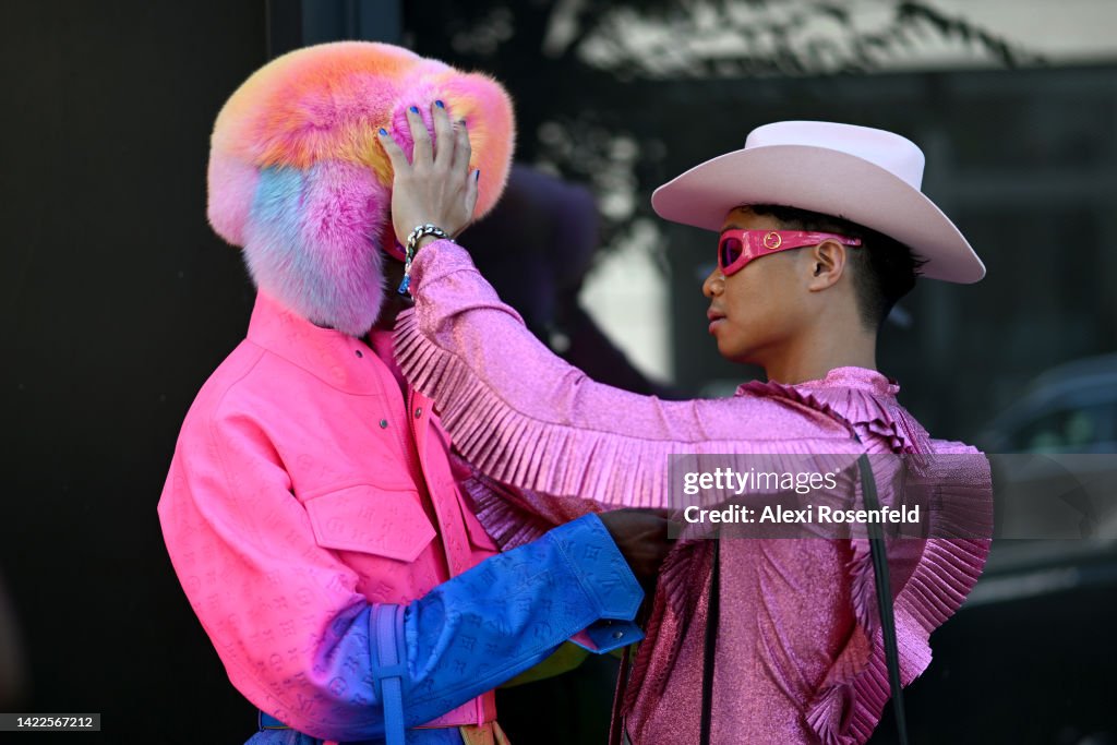 Devin Thorpe wearing a rainbow jacket, fur hat and bag by Louis News  Photo - Getty Images