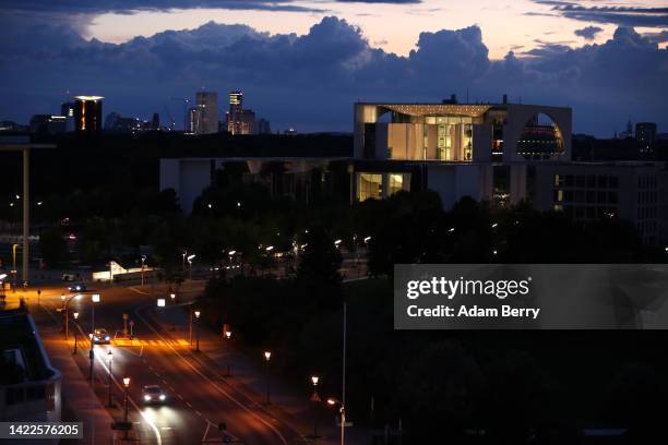 Traffic passes the mostly-dimmed German federal Chancellery in the evening on September 10, 2022 in Berlin, Germany. The German government is...