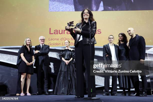 Laura Poitras receives the Golden Lion for Best Film for "All the Beauty and the Bloodshed" during the closing ceremony of the 79th Venice...