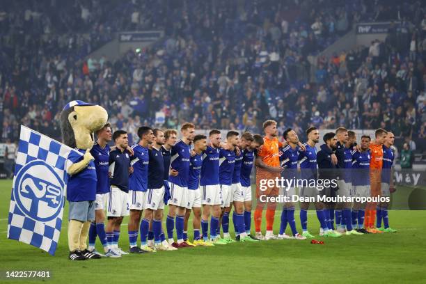 Players of FC Schalke 04 acknowledge fans as they celebrate their victory after the Bundesliga match between FC Schalke 04 and VfL Bochum 1848 at...