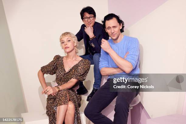 Sophia Di Martino, Ke Huy Quan, and Tom Hiddleston pose at the IMDb Official Portrait Studio during D23 2022 at Anaheim Convention Center on...