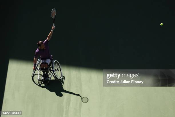 Gordon Reid of Great Britain and partner Alfie Hewett of Great Britain return a shot against Martin De La Puente of Spain and Nicolas Peifer of...