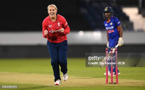 England bowler Sarah Glenn celebrates the wicket of India batter Shafali Verma during the 1st Vitality IT20 match between England and India at Seat...