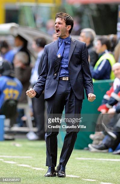 Head coach Andrea Stramaccioni of FC Inter Milan celebrates a goal during the Serie A match between FC Internazionale Milano and Genoa CFC at Stadio...