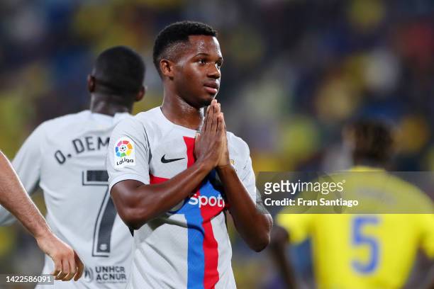 Ansu Fati of FC Barcelona celebrates after scoring their side's third goal during the LaLiga Santander match between Cadiz CF and FC Barcelona at...
