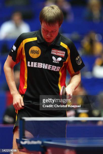 Patrick Baum of Germany looks dejected during his match against Wang Hao of China during the LIEBHERR table tennis team world cup 2012 championship...