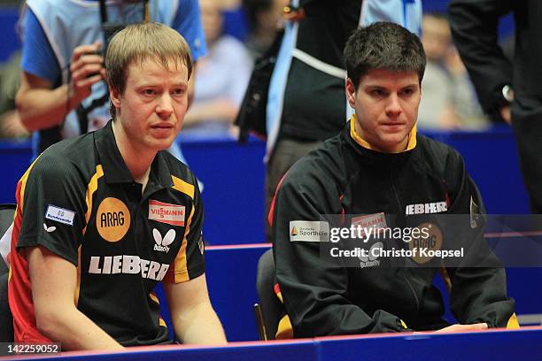 Patrick Baum and Dimitrij Ovtcharov of Germany look dejected after losing the LIEBHERR table tennis team world cup 2012 championship division men's...