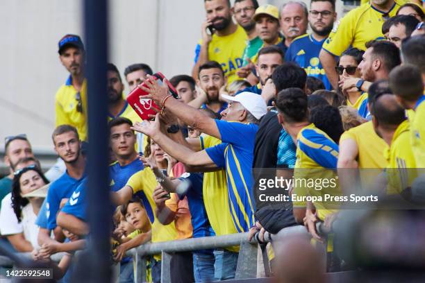 Spectators and medical staff are seen assisting a patient in the stands as the match is interrupted during the spanish league, La Liga Santander,...