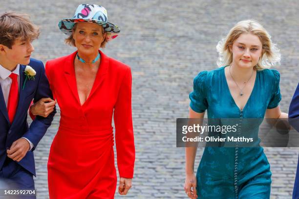 Princess Delphine of Belgium and her family arrive at the Cathedral of St. Michael and St. Gudula to attend the wedding of Princess Maria-Laura of...