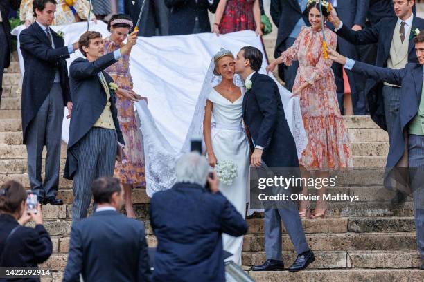 Princess Maria-Laura of Belgium and William Isvy leave the Cathedral of St. Michael and St. Gudula after their wedding on September 10, 2022 in...