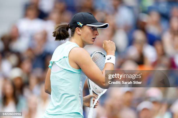 Iga Swiatek of Poland celebrates a point against Ons Jabeur of Tunisia during their Women’s Singles Final match on Day Thirteen of the 2022 US Open...