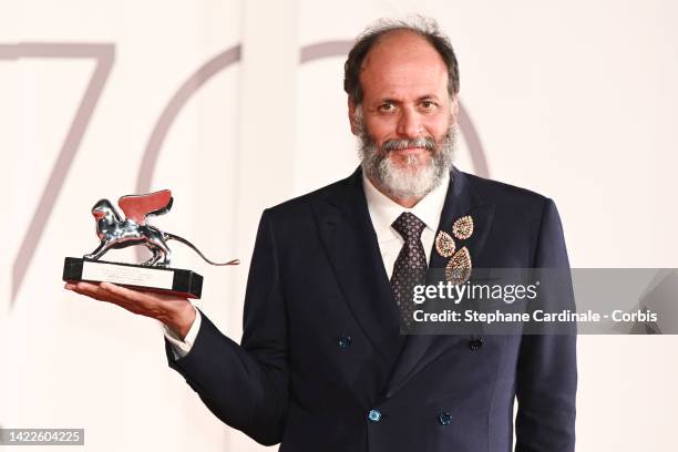 Luca Guadagnino poses with the Silver Lion for Best Director for "Bones And All" during the award winners photocall at the 79th Venice International...