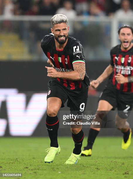Olivier Giroud of AC Milan celebrates after scoring the goal during the Serie A match between UC Sampdoria and AC MIlan at Stadio Luigi Ferraris on...