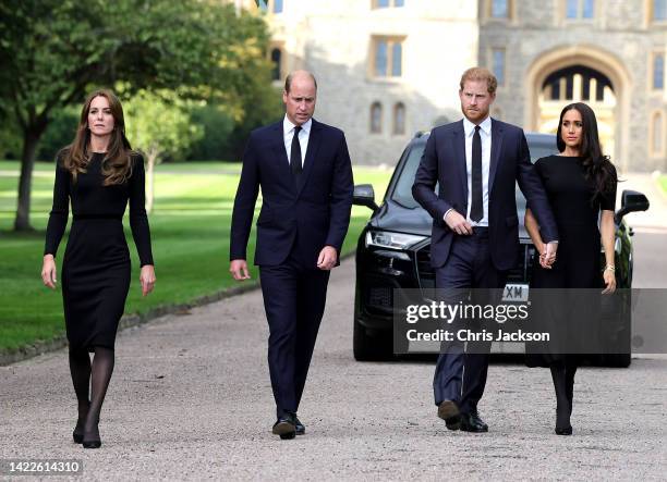 Catherine, Princess of Wales, Prince William, Prince of Wales, Prince Harry, Duke of Sussex, and Meghan, Duchess of Sussex on the long Walk at...