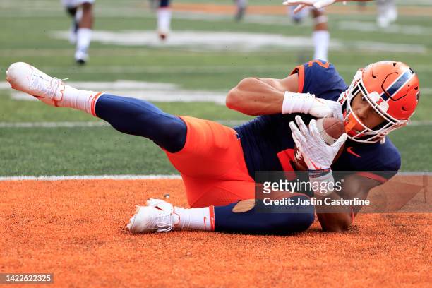 Matthew Bailey of the Illinois Fighting Illini recovers a fumble for a touchdown during the first quarter in the game against the Virginia Cavaliers...