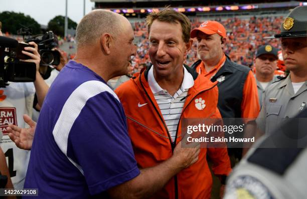 Head coach Dabo Swinney of the Clemson Tigers and head coach Clay Hendrix of the Furman Paladins talk after the Clemson Tigers defeated the Furman...