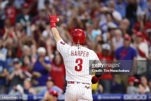 Bryce Harper of the Philadelphia Phillies celebrates after hitting a two run home run during the third inning against the Washington Nationals at...