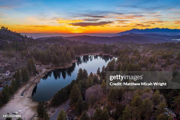 aerial views over green valley lake, at sunset. - san bernardino california stock pictures, royalty-free photos & images