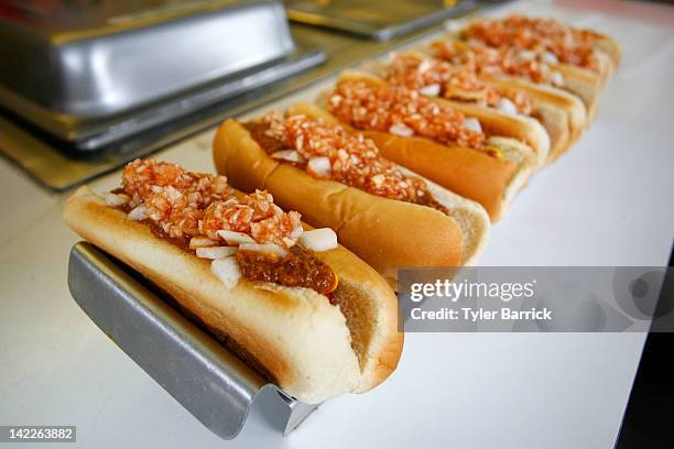 Martinsville Slider hot dogs are prepared in a concession stand prior to the start of the NASCAR Sprint Cup Series Goody's Fast Relief 500 at...