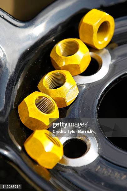 Lug nuts rest in a tire prior to the start of the NASCAR Sprint Cup Series Goody's Fast Relief 500 at Martinsville Speedway on April 1, 2012 in...