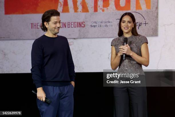 Diego Luna and Adria Arjona speak onstage during D23 Expo 2022 at Anaheim Convention Center in Anaheim, California on September 10, 2022.