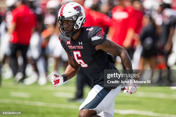 Wide receiver J.J. Sparkman of the Texas Tech Red Raiders warms up before the game against the Houston Cougars at Jones AT&T Stadium on September 10,...