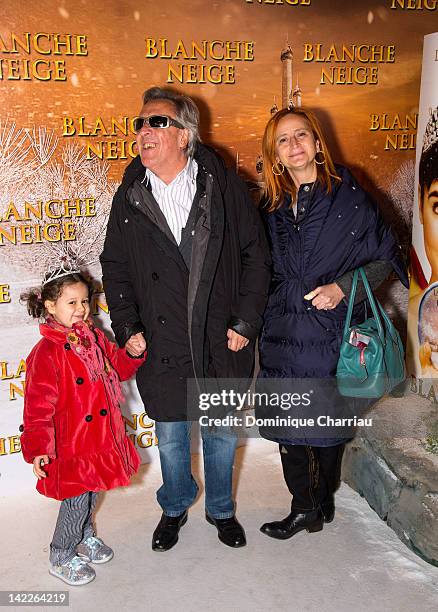 Gilbert Montagne and Jeanne Pobel pose during the 'Blanche Neige' Paris Premiere Photo call at Gaumont Capucines on April 1, 2012 in Paris, France.