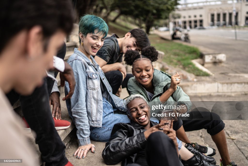 Friends talking in the street