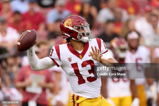 Caleb Williams of the USC Trojans throws a touchdown pass to Jordan Addison of the USC Trojans in the first quarter against the Stanford Cardinal at...