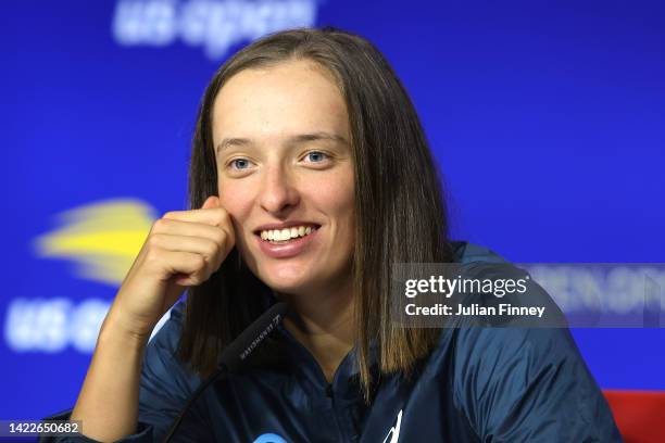 Iga Swiatek of Poland talks during a press conference after defeating Ons Jabeur of Tunisia after their Women’s Singles Final match on Day Thirteen...