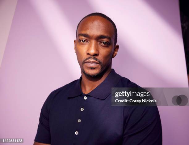 Anthony Mackie poses at the IMDb Official Portrait Studio during D23 2022 at Anaheim Convention Center on September 10, 2022 in Anaheim, California.