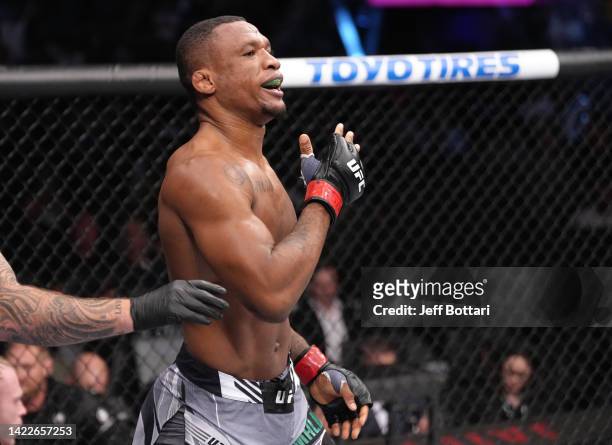 Jailton Almeida of Brazil celebrates after his submission victory over Anton Turkalj of Sweden in a 220-pound catchweight fight during the UFC 279...