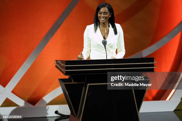 Naismith Memorial Basketball Hall of Fame Class of 2022 enshrinee Swin Cash speaks during the 2022 Basketball Hall of Fame Enshrinement Ceremony at...