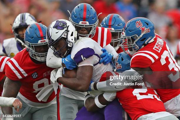 Khari Coleman of the Mississippi Rebels tackles Darius Hale of the Central Arkansas Bears at Vaught-Hemingway Stadium on September 10, 2022 in...