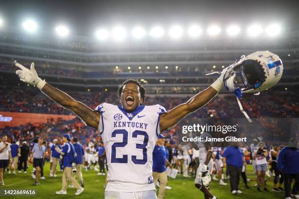 Andru Phillips of the Kentucky Wildcats celebrates after defeating the Florida Gators 26-16 in a game at Ben Hill Griffin Stadium on September 10,...