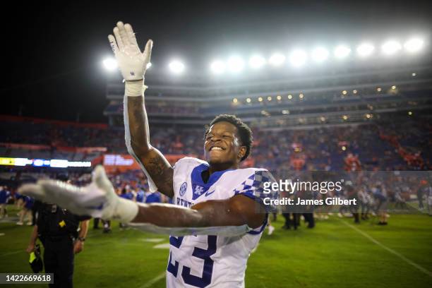 Andru Phillips of the Kentucky Wildcats celebrates after defeating the Florida Gators 26-16 in a game at Ben Hill Griffin Stadium on September 10,...
