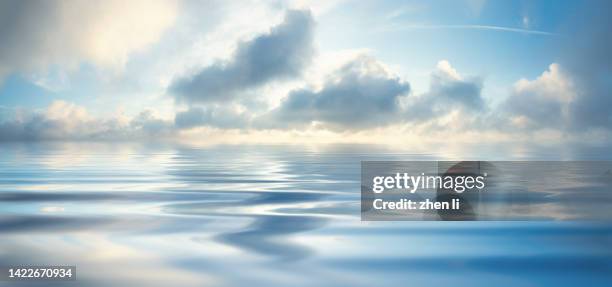 sky reflecting in lake - water surface stock pictures, royalty-free photos & images