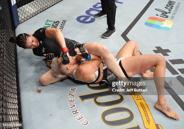 Irene Aldana of Mexico punches Macy Chiasson in a 140-pound catchweight fight during the UFC 279 event at T-Mobile Arena on September 10, 2022 in Las...